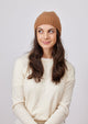 Tobacco brown cashmere slouchy cuff beanie on model looking to her right