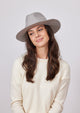 Model wearing a grey wool felt brimmed hat