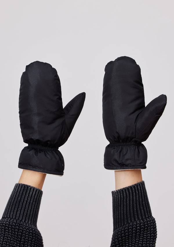 Water resistant black mittens on model