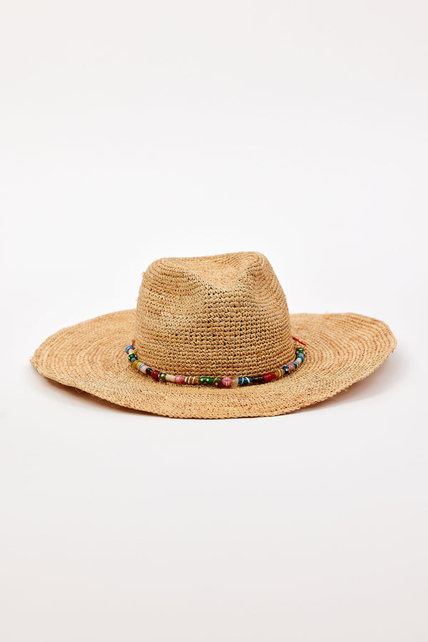 Straw hat with a colorful bead band on a white background