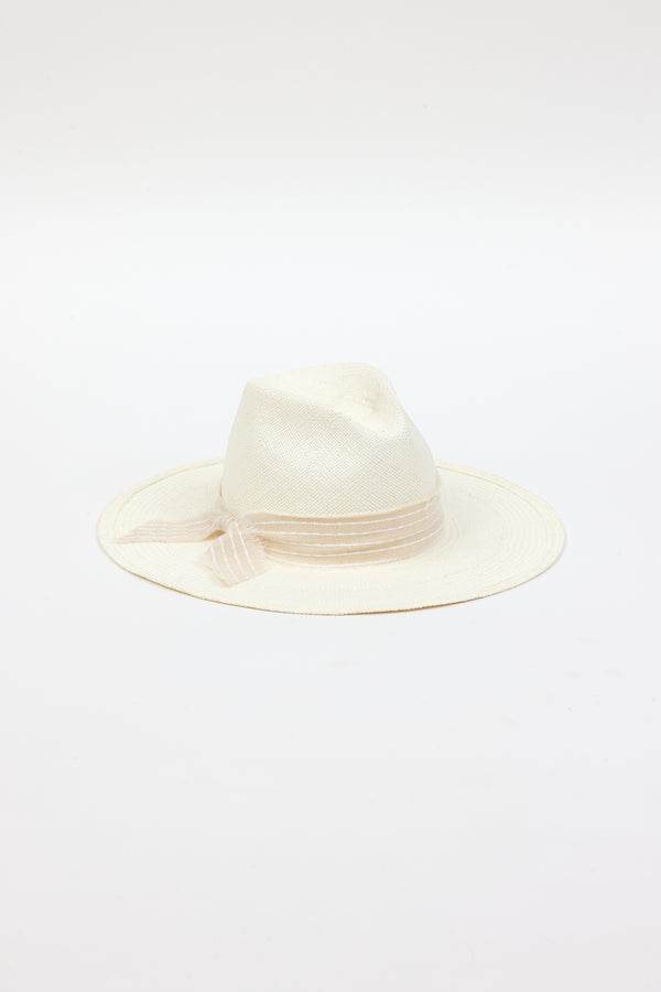 3/4 angle of white panama hat with tan dotted stripe trim