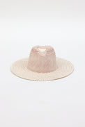 Front angle of pink and natural colored brimmed straw sun hat