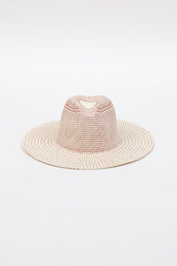 Front angle of pink and natural colored brimmed straw sun hat