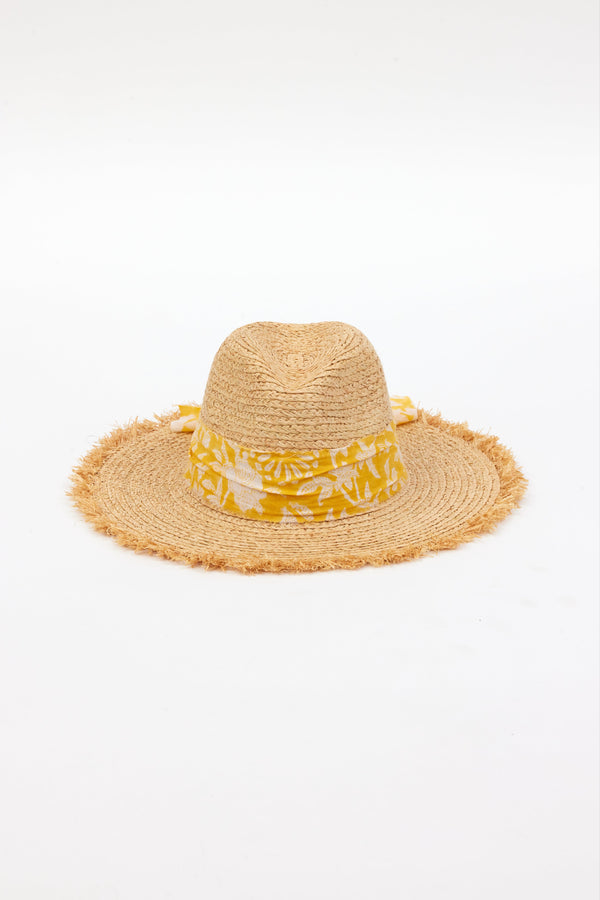 front of braided raffia sunhat with yellow floral trim