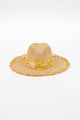 front of braided raffia sunhat with yellow floral trim