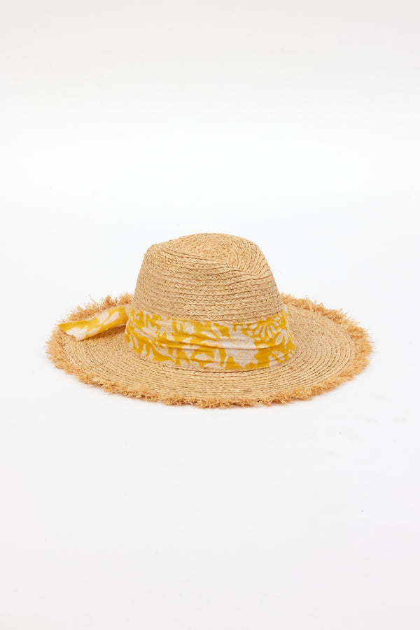 3/4 angle of braided raffia sunhat with yellow floral trim