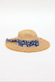 braided raffia sunhat with royal blue floral trim