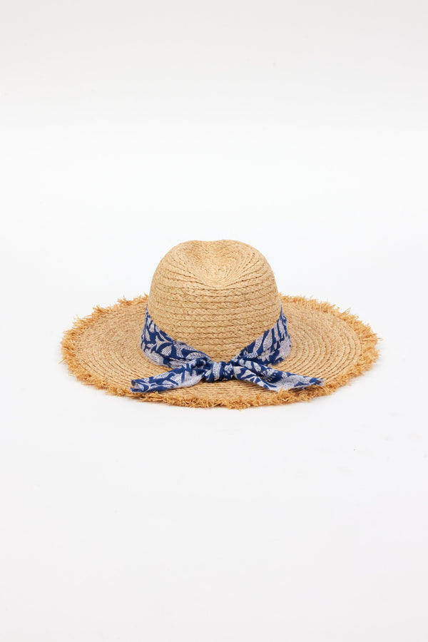 back of braided raffia sunhat with royal blue floral trim