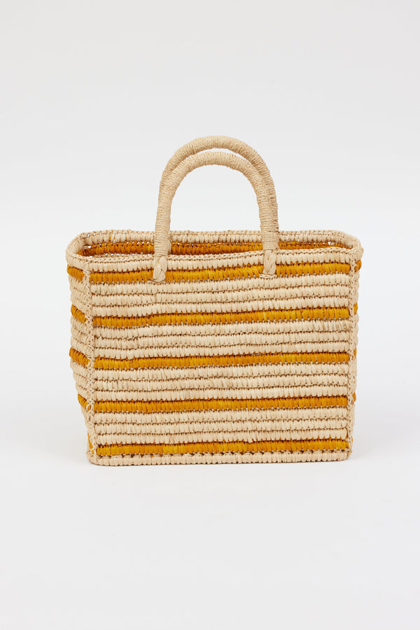 light tan straw bag with brown stripes