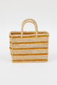 light tan straw bag with brown stripes