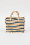 light tan straw bag with blue stripes
