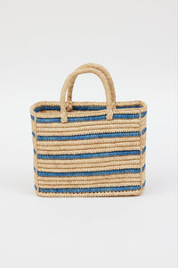 light tan straw bag with blue stripes