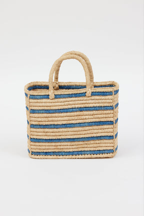 light tan straw bag with blue stripes