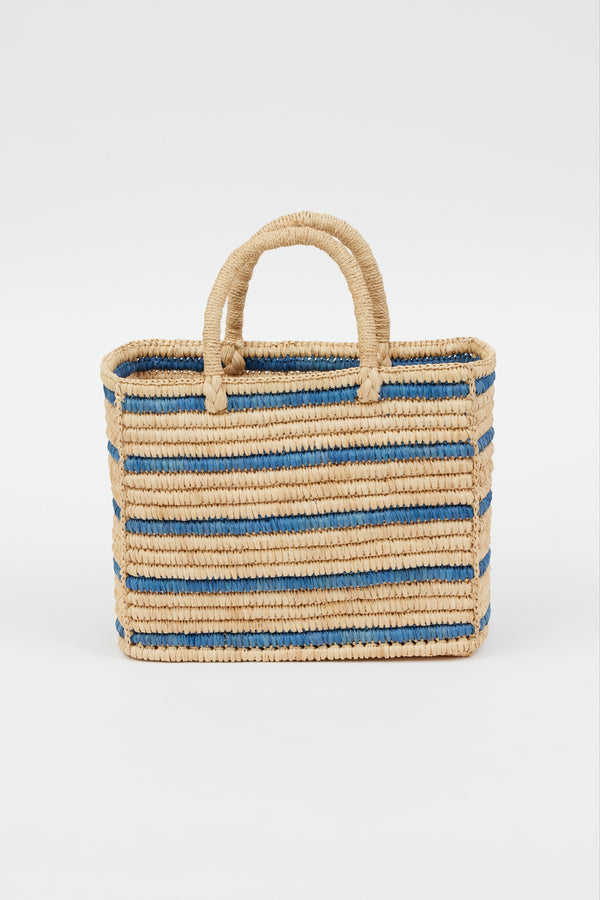 light tan straw bag with blue stripes