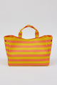 coral and yellow striped tote bag