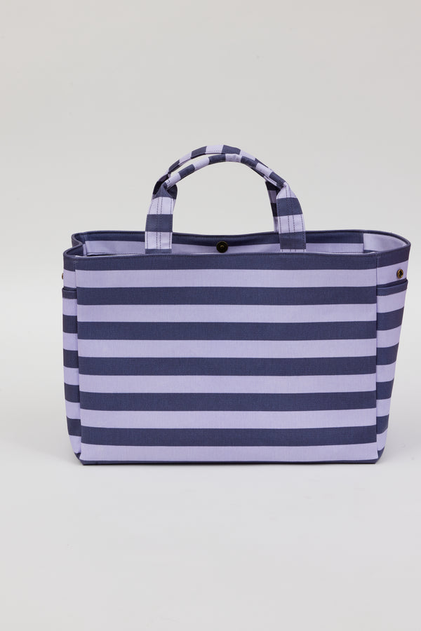 blue and lavender striped bag with snap closure