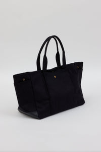 3/4 angle of black tote with pockets