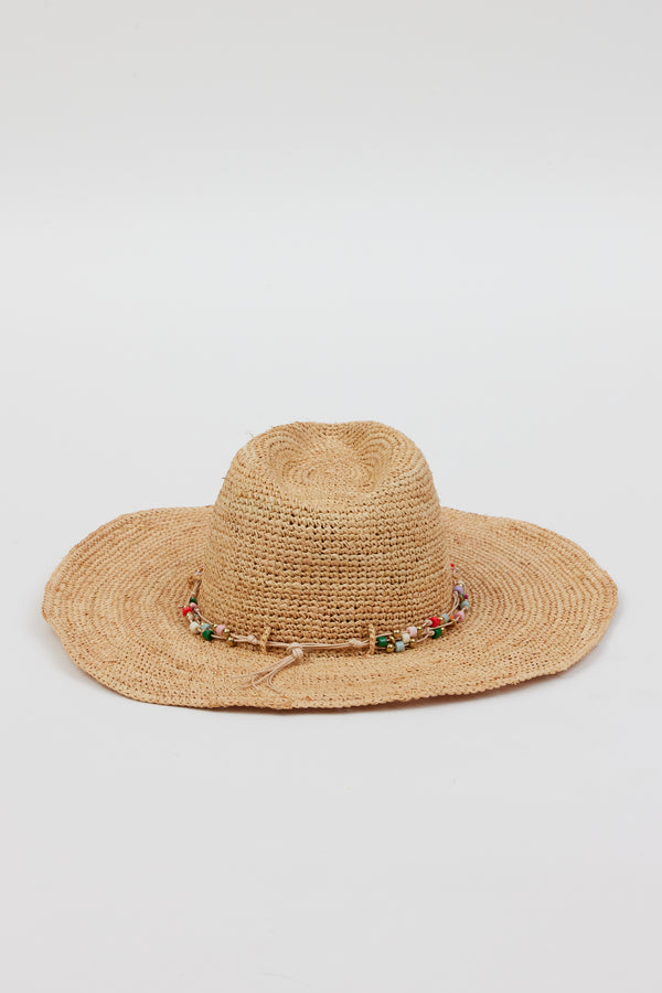 Back of tan straw woven sunhat with multi colored beaded trim