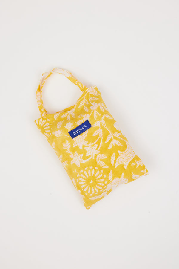 yellow and white floral sarong bag