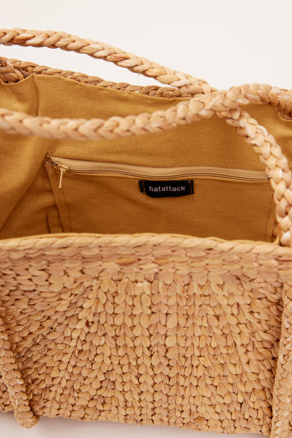 Inside of woven straw bag