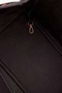 Interior of black tote with pockets