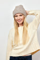 Model wearing taupe beanie