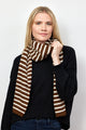 Brown and ivory ribbed striped scarf on model in black sweater