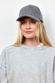 Model wearing grey wool blend baseball cap