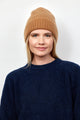 Camel brown cashmere rib beanie on model