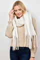 Ivory solid scarf with fringe on model