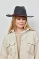 Model wearing charcoal wool felt brimmed hat with burgundy tie trim and tan jacket