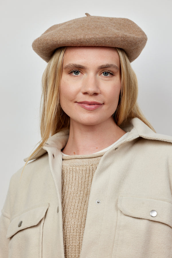 Model wearing taupe wool felt beret