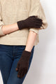 Model wearing brown knit touch screen gloves