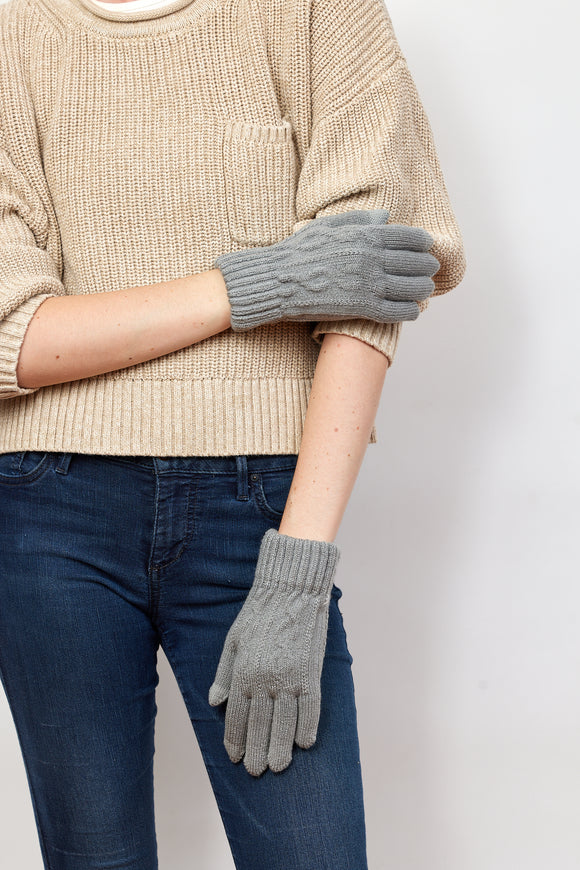 Model wearing grey knit touch screen gloves