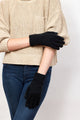 Model wearing black knit touch screen gloves