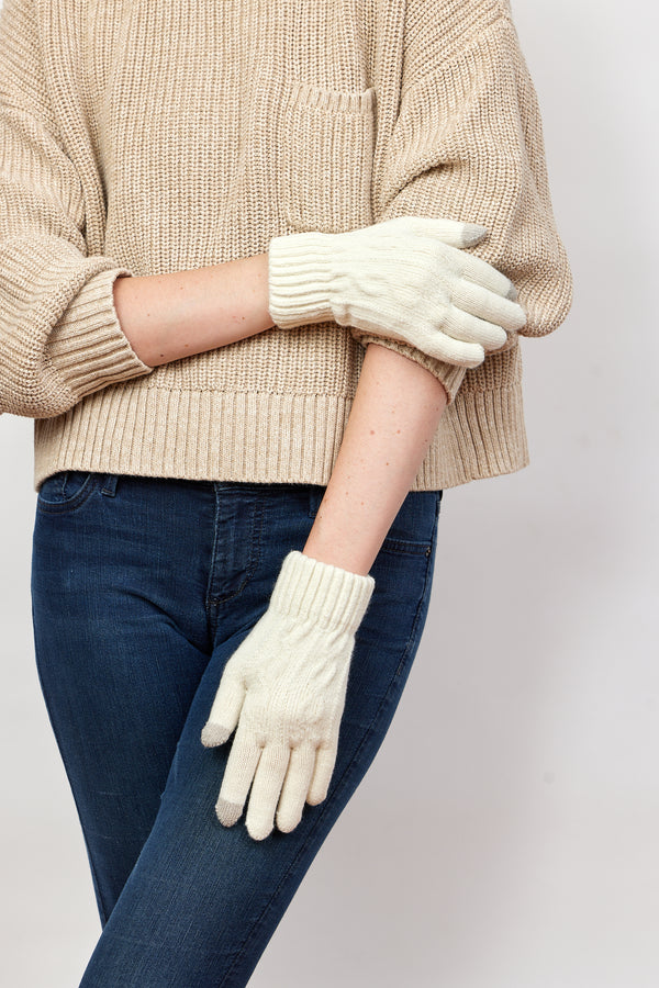 Model wearing ivory knit touch screen gloves