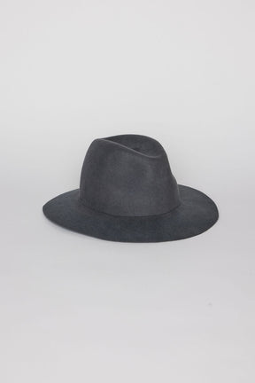Dark gray fedora hat on a light gray background