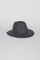 Dark gray fedora hat on a light gray background