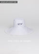 White canvas packable hat with fringe and script embroidered letters