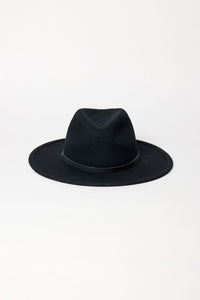 Black fedora hat on a white background