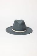 Blue fedora hat with a white band on a light gray background