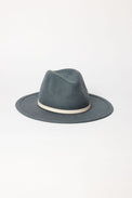 Blue fedora hat with a white band on a light gray background