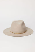 Beige hat with a gold chain on a white background
