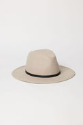 Beige fedora hat with a black band on a white background