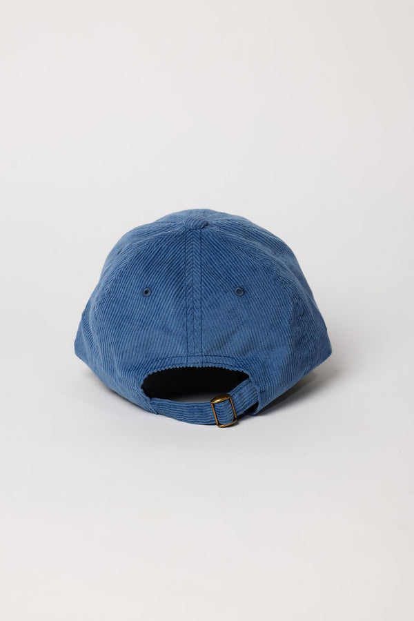 Back of blue corduroy baseball cap