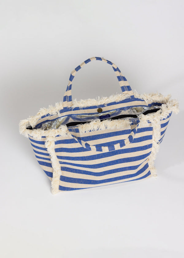 straps and opening of blue and tan striped cooler bag