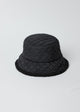 Black quilted bucket hat with faux fur lining