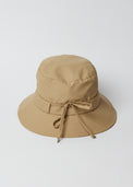 Back of camel brown water resistant bucket hat