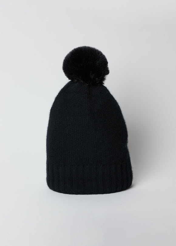 Black cashmere slouchy beanie with faux fur pom