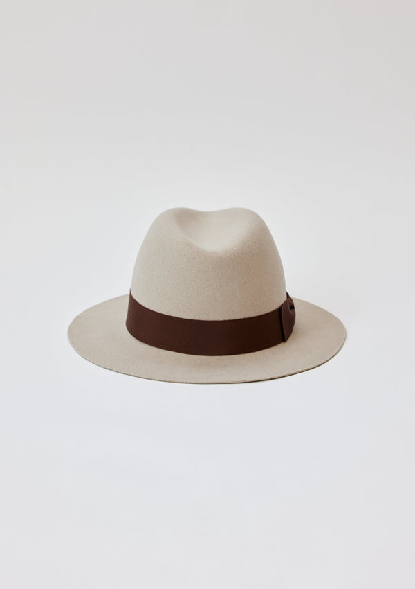 Back of beige fedora with brown bow trim